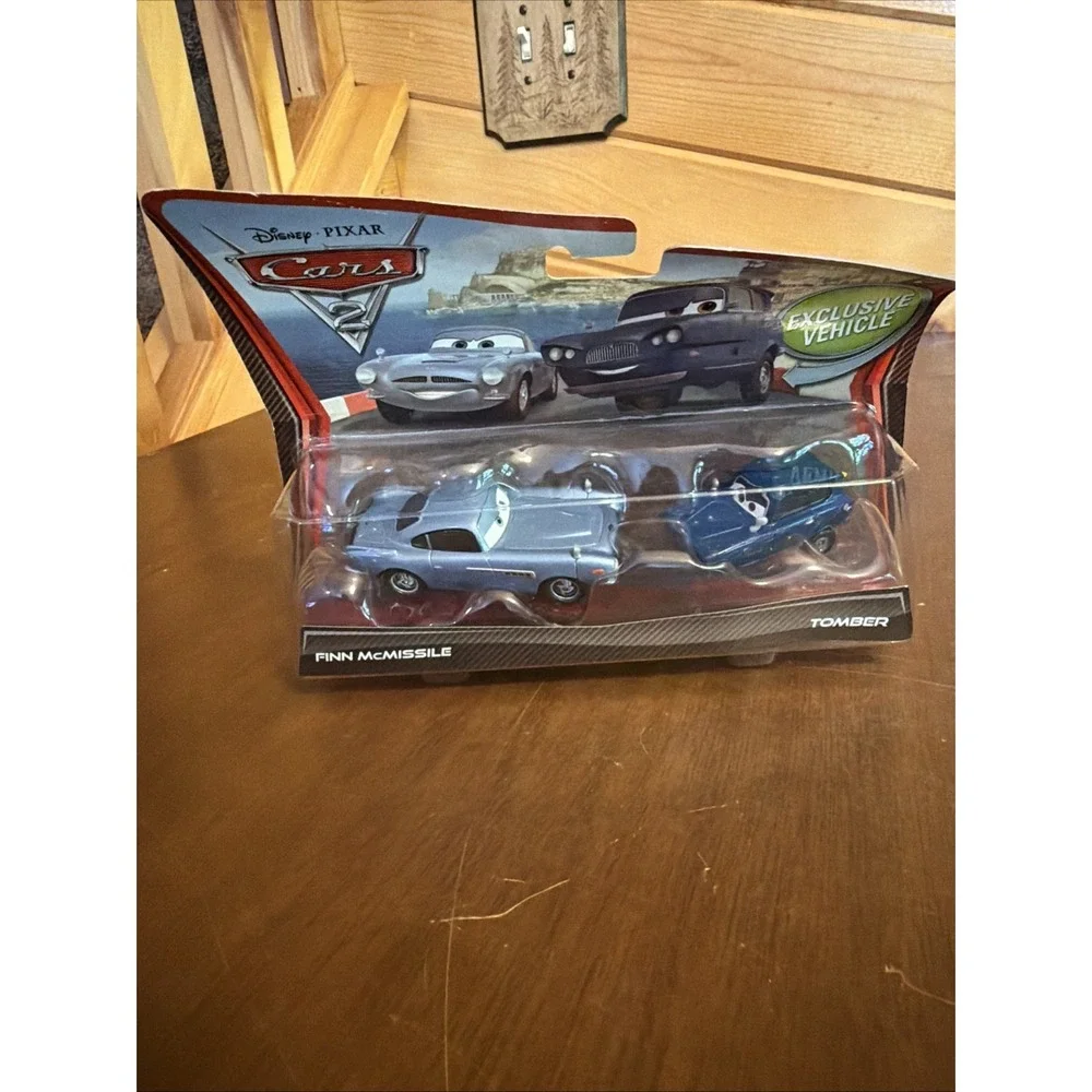 FINN McMISSILE + TOMBER - Original 2010 Disney Pixar Cars 2 Car Set! SEALED!